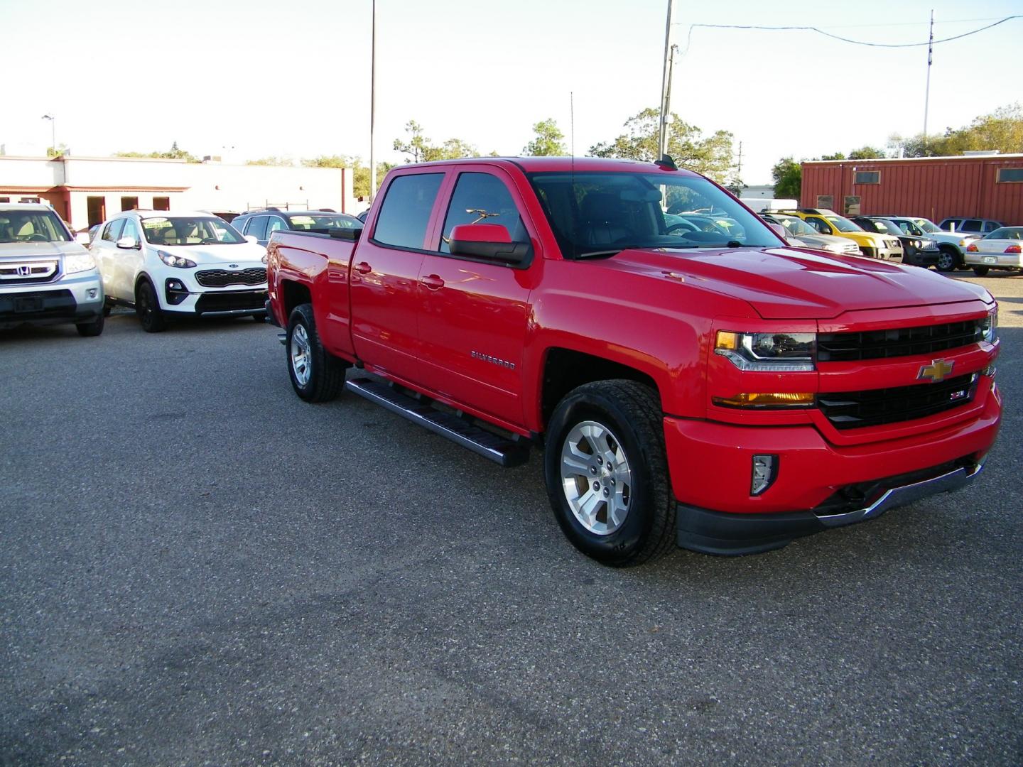 2018 Red /Black Chevrolet Silverado 1500 LT Z71 (3GCUKREC8JG) with an 5.3 V8 engine, Automatic transmission, located at 4000 Bee Ridge Road, Sarasota, FL, 34233, (941) 926-0300, 27.298664, -82.489151 - Photo#2